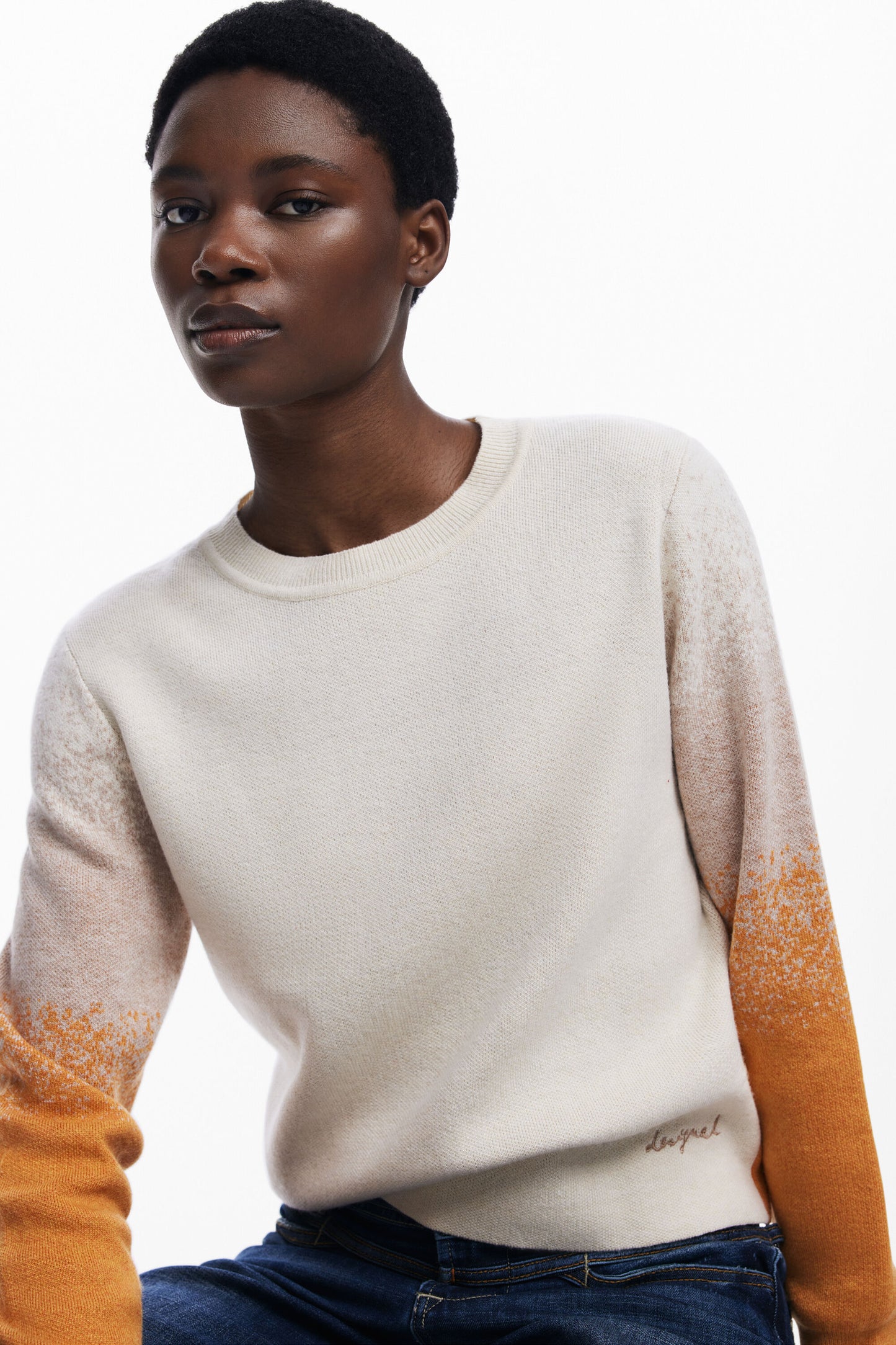 Lightweight long-sleeve sweater from Spanish brand DESIGUAL with a round neck, colour gradient, and embroidered logo detail. Long sleeves with ribbed cuff.