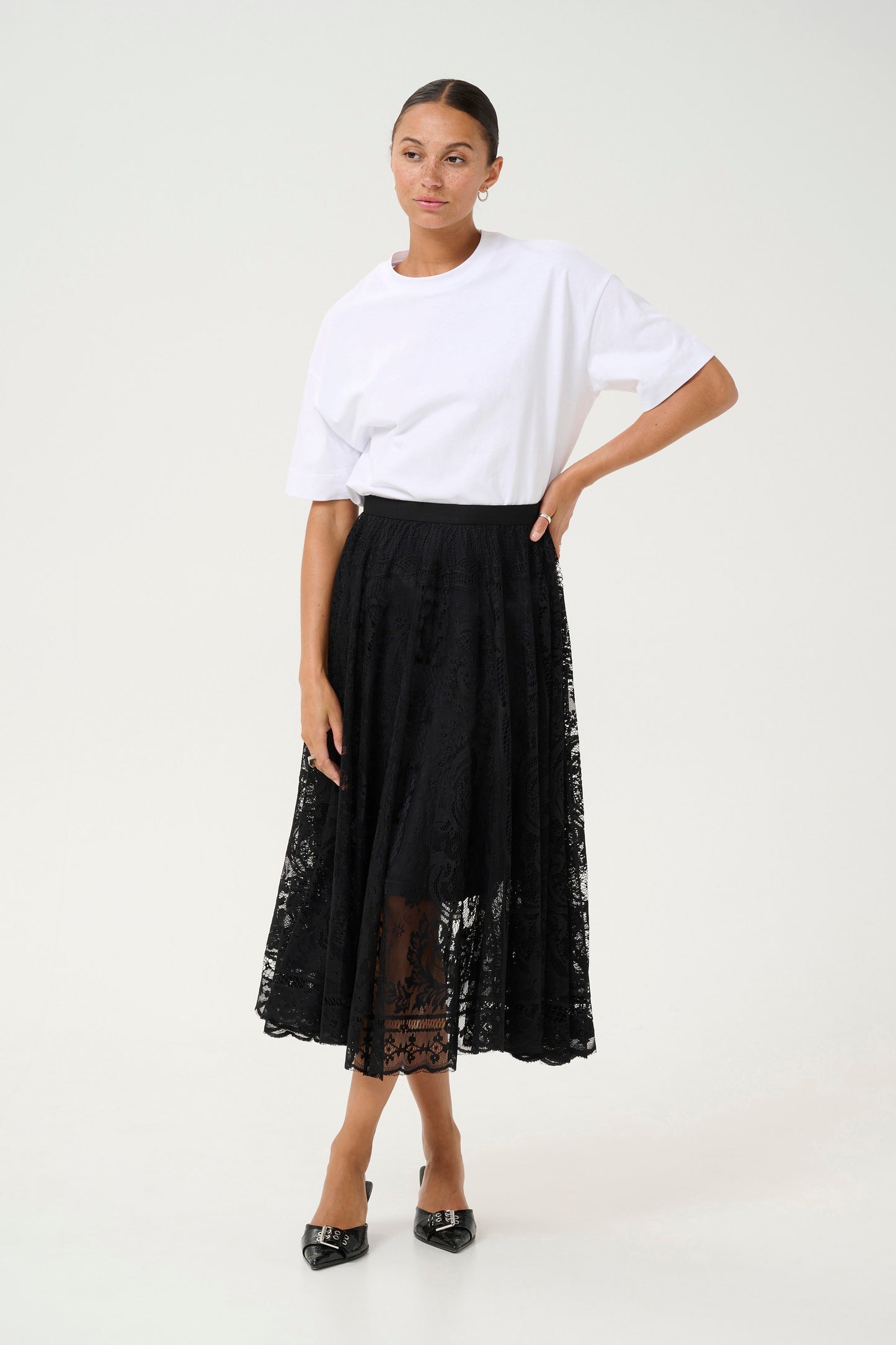 A lace skirt from our favourite KAFFE. A pull on piece lined to the knee with a thick elasticated waistband. Pretty and very versatile this skirt fits true to size.