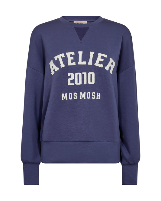 A soft, oversized sweatshirt from MOS MOSH with a casual yet refined look. Designed with a round neckline, ribbed trims, and a bold front print for a sporty edge. The fabric blend feels smooth and comfortable, making it perfect for laid-back days or styled with tailored pieces for a cool contrast.
