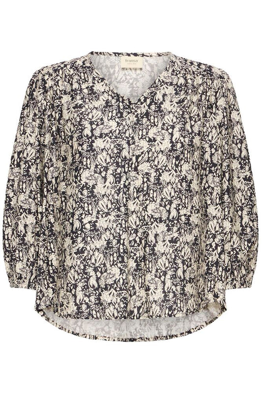 This v-neck blouse from FRANSA features a straight, relaxed silhouette with cropped, gently puffed sleeves and an airy, lightweight texture. The curved hem and soft drape enhance its effortlessly cool appeal.