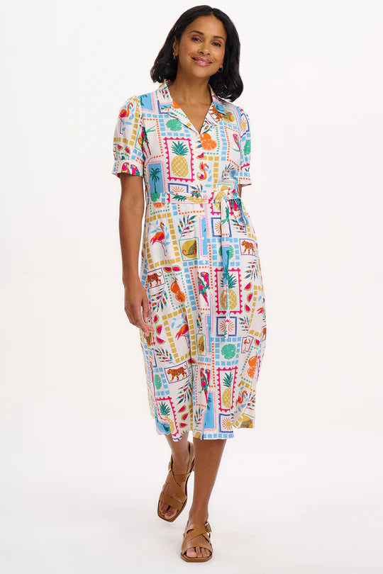 The Penelope from SUGARHILL is a feminine midi-length dress with a button placket and puff sleeves. The lapel collar and a self-fabric waist tie add to the fit-and-flare shape of this style. Featuring our new Jungle Tile print of colourful tropical collage-style wildlife, fruit and plants on an off-white base.