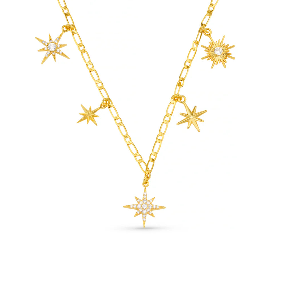 Elevate your evening attire with the Statement Starburst Charm Drop Necklace. Featuring crystal starburst charms, no two the same, along a refined long chain. This elegant piece captures the light with subtle sophistication.