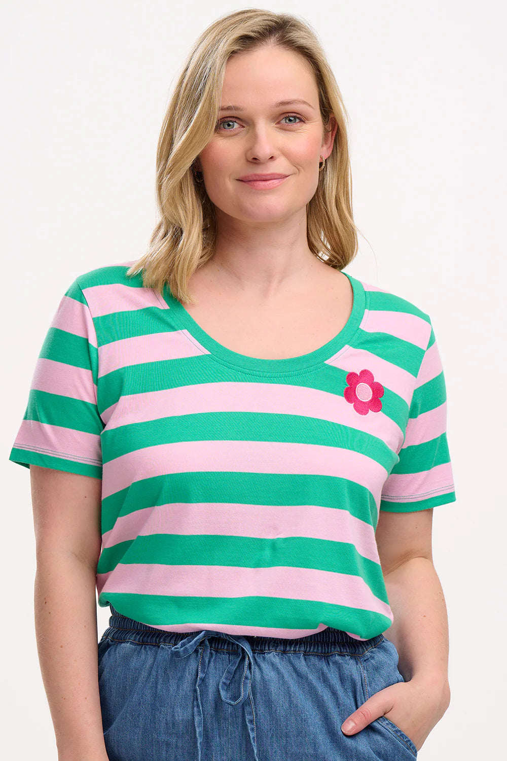The Sylvie from SUGARHILL features straight side seams alongside a beautifully curved hem at the front and back. With a more relaxed fit and a deeper scoop neckline. We adore the soft feel of the 100% Organic Cotton fabric, which truly makes this tee stand out.