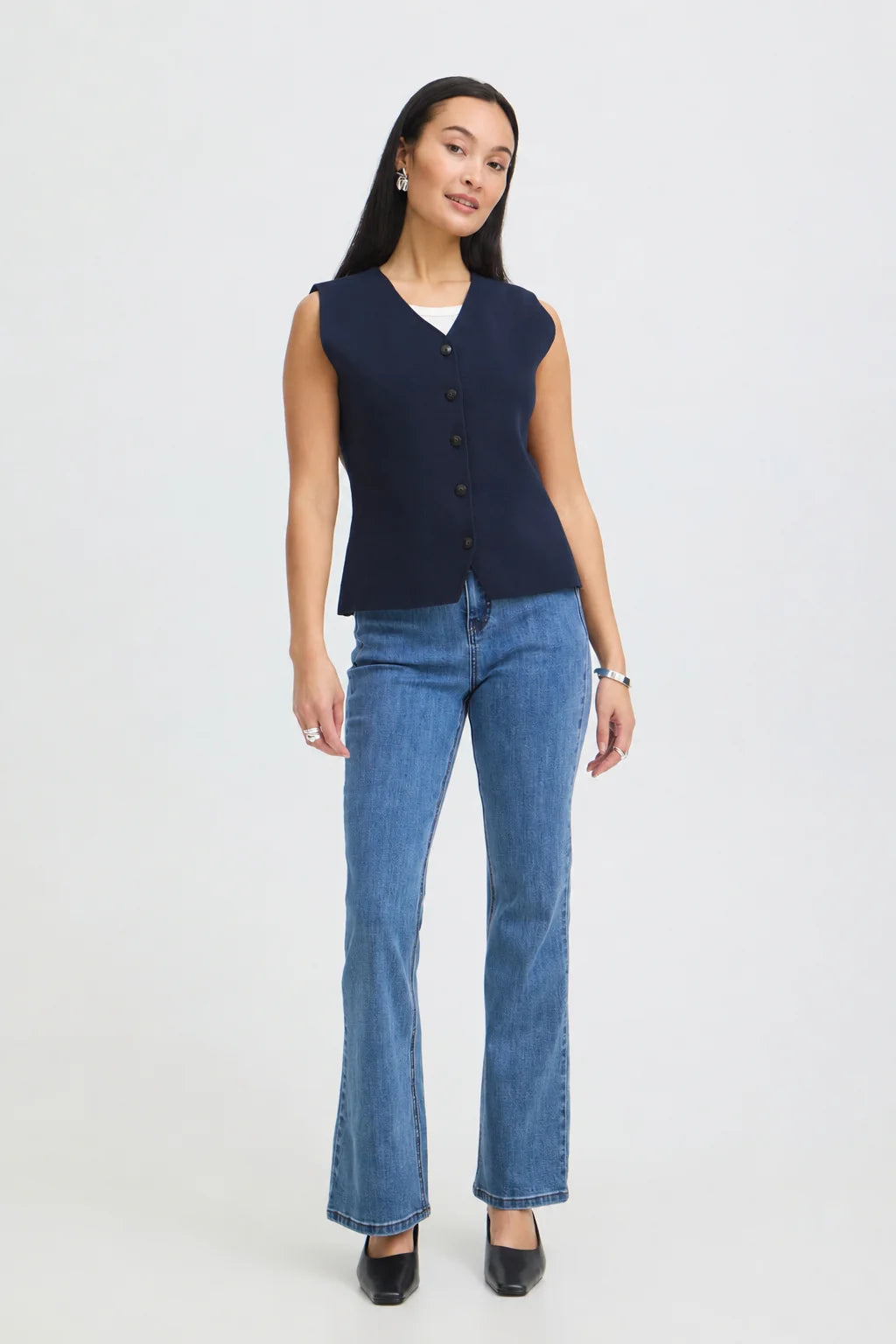 A versatile waistcoat from Scandi brand FRANSA that brings effortless sophistication to any wardrobe. The balanced cotton-polyester blend delivers a polished look while maintaining all-day wearability—no compromise between style and comfort. Layer it over shirts, dresses, or knitwear for instant editorial appeal.