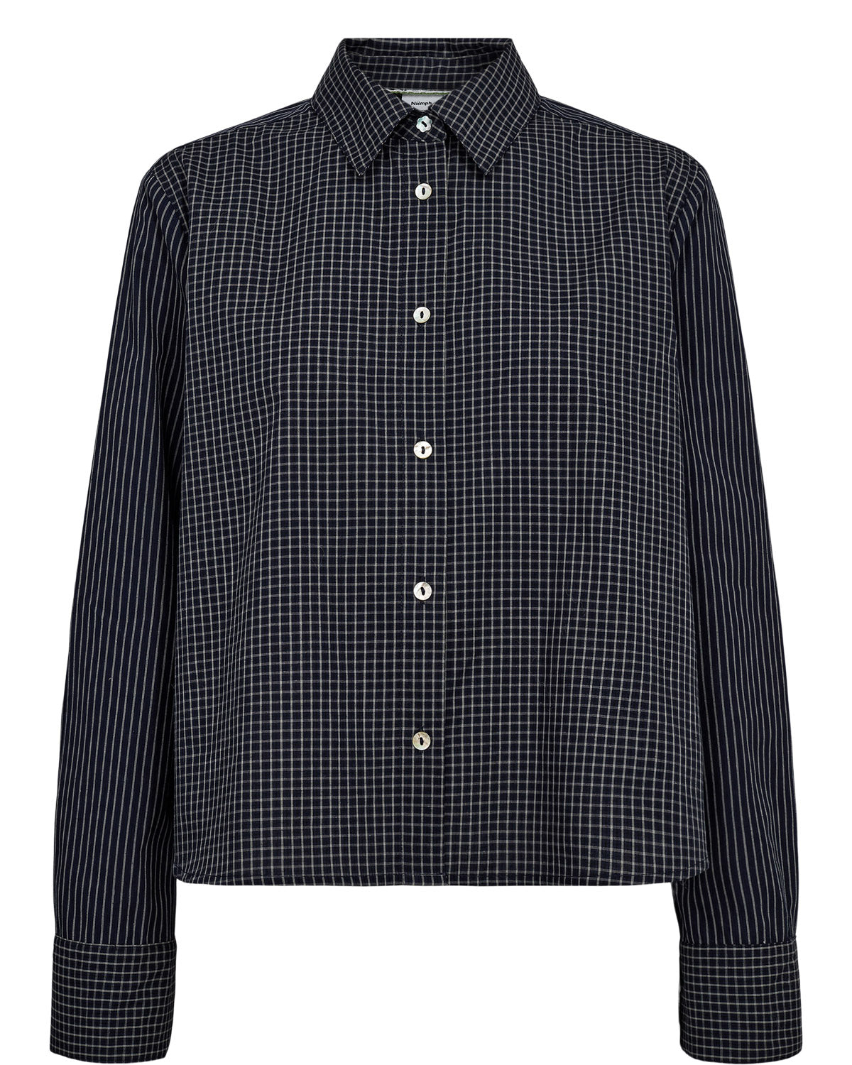 The NUMPH Nuriya Shirt combines contemporary style with thoughtful design details. This deep taupe checked shirt features striking striped arms that create an eye-catching contrast, blending classic tailoring with modern visual interest. 