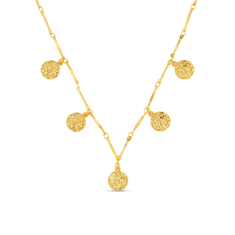 The Mini Molten Coin Charm Necklace from ORELIA features delicate textured coin charms along a bar link chain. Its understated design adds quiet interest while keeping the overall look clean and minimal.