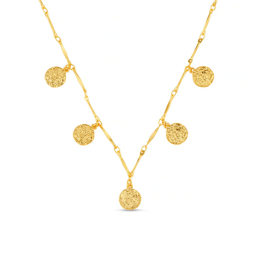 The Mini Molten Coin Charm Necklace from ORELIA features delicate textured coin charms along a bar link chain. Its understated design adds quiet interest while keeping the overall look clean and minimal.