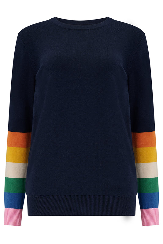 The Rita Jumper from SUGARHILL is giving serious retro vibes – and we’re obsessed. This semi-fitted bestseller is made from a soft, lightweight cotton-mix, with a classic crew neck and mid-hip cut that’s super easy to wear. The Retro Stripes design channels all the ‘70s feels, with bold bands of sunset-inspired hues – think oranges, reds, and golds – popping against a deep navy base. It’s a warm, nostalgic colour combo that brings instant personality to any outfit. Vintage vibes, modern comfort – what’s not