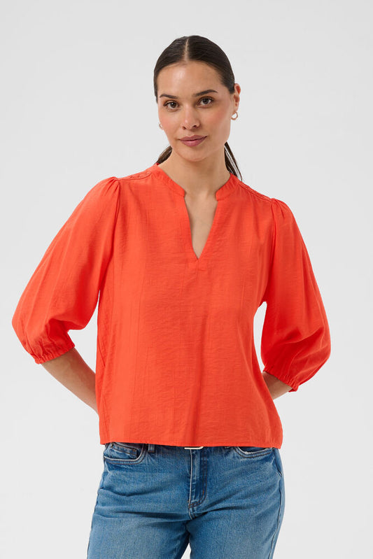 From Scandi brand KAFFE, the Tigerlily Blouse is an effortlessly stylish piece you'll reach for season after season. Designed with a flattering notch neckline and subtle shoulder detailing, it features three-quarter length sleeves 
