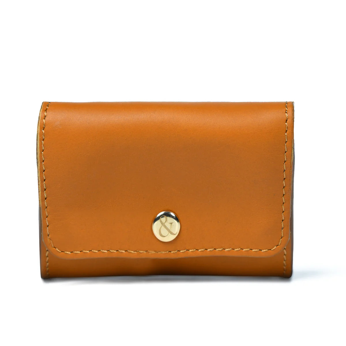 With more space for your cards and notes, and an added zip section for your coins, our new Amelie purse will keep your money and cards in place.

Hand made in our super soft caramel vegetable tanned leather with our personalised ampersand popper stud closure.
