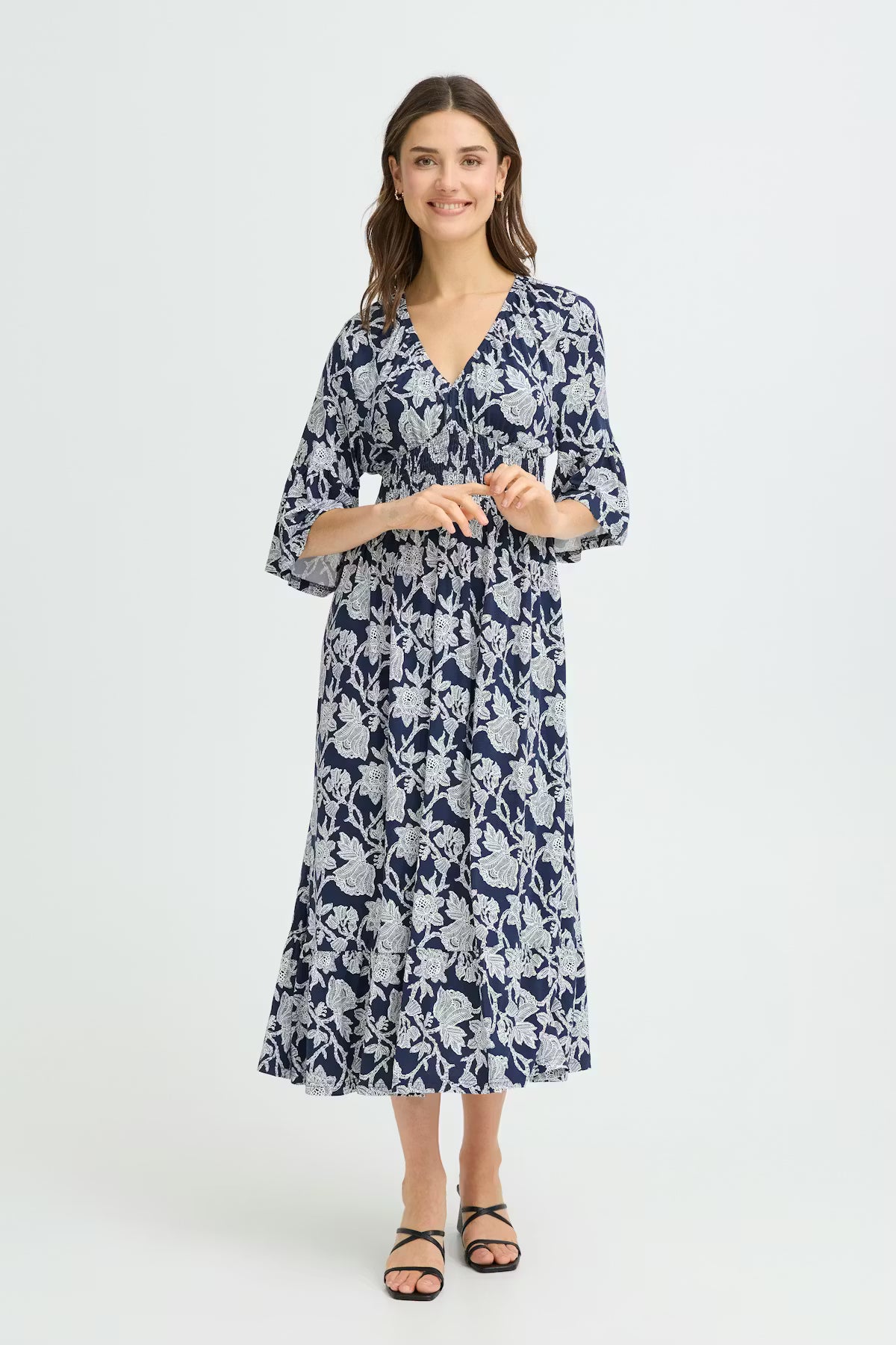 Midi dress form FRANSA with floral all-over pattern, V-neckline, and half-length wide sleeves. Relaxed, flowing silhouette with gathered waist detail for added shape.