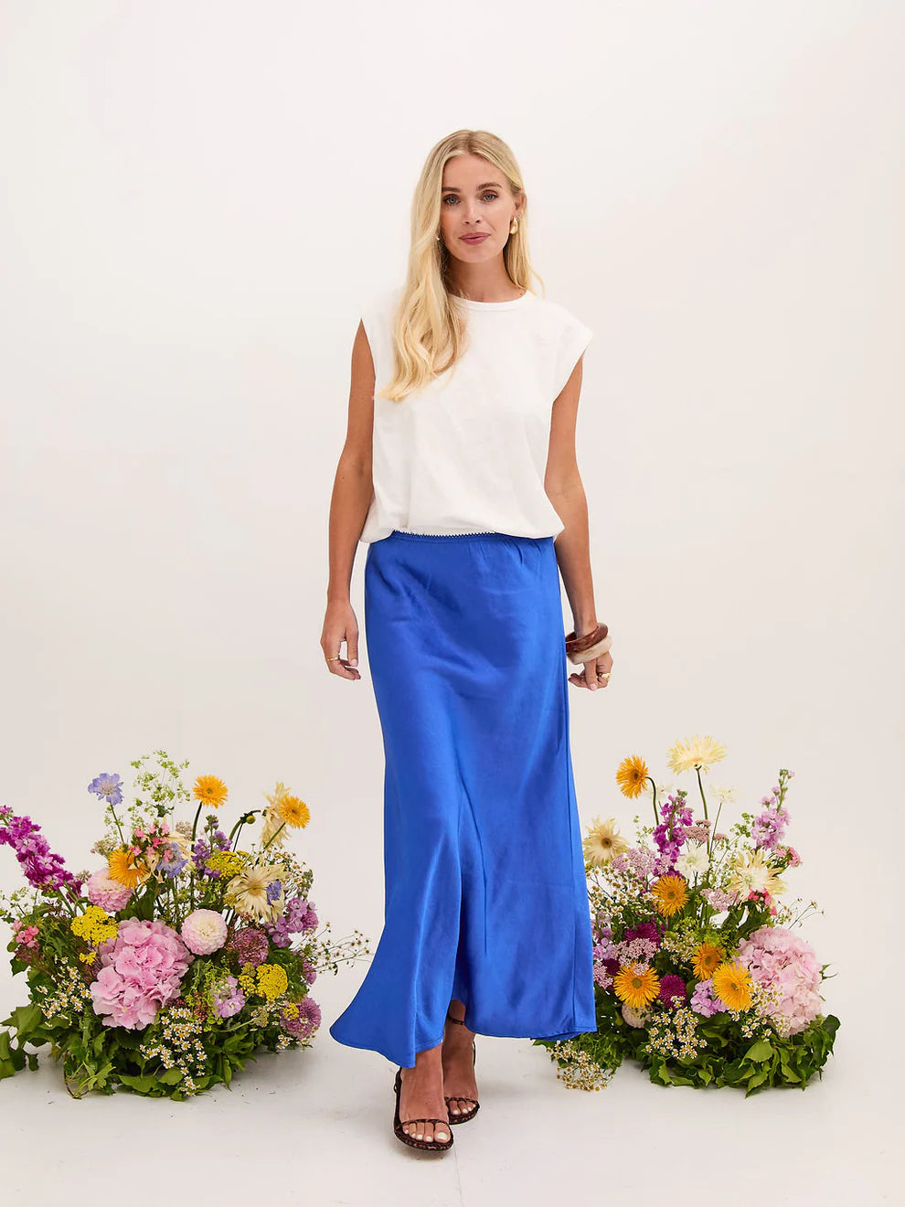 Our bestselling satin skirt, designed to be worn again and again from FIKA. Cut on the bias in a flattering midi length, it’s crafted from premium, heavier-weight satin that drapes fluidly over the body. An elasticated waistband offers all-day comfort and effortless ease.