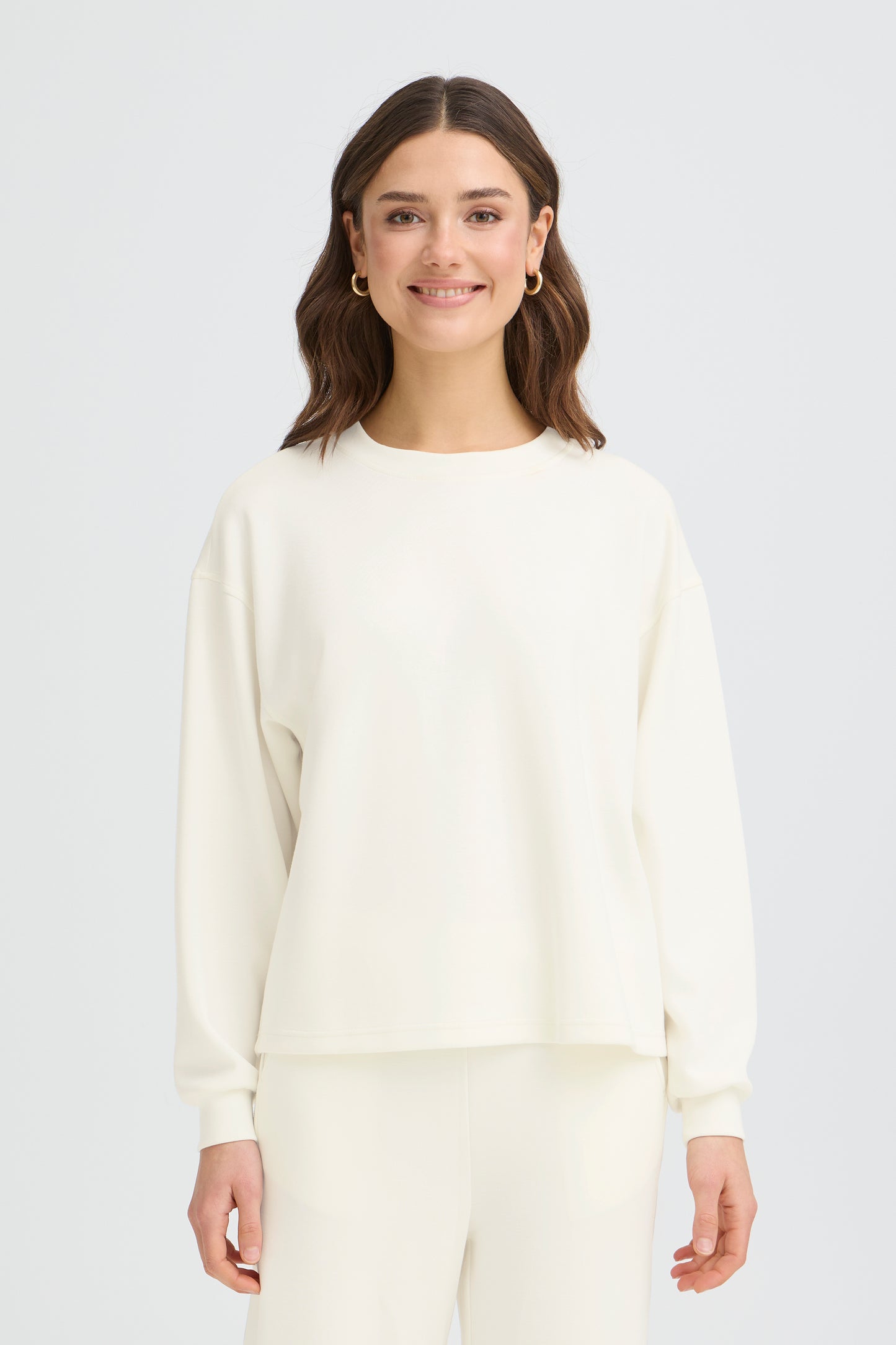 A best seller every season this gorgeous yet simple sweatshirt from FRANSA comes in three great colours. A round neck sweat with long sleeves with a cuff that will work so hard in your Spring wardrobe. The fit is true to size.