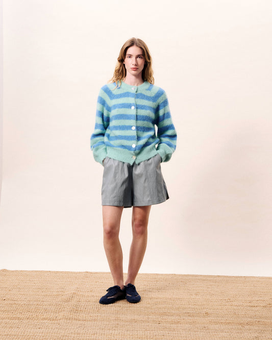 A super cute round neck cardigan in a fluffy knit. from FRNCH. The pastel combination of shades is pretty and stylish. With long sleeves and button fastening this piece is a complete winner. Fits true to size.
