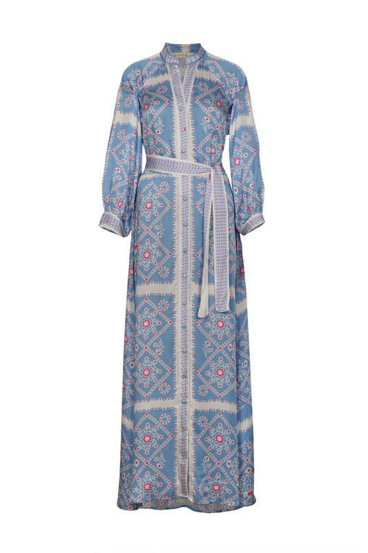 Simply stunning, this dress from BRDR is so pretty and perfect for a Summer wedding or The Races. In a stunning Summer blue print this eye catching print has accents of white and pink. The notch neck adds a touch of glamour and is super flattering for a fuller bust. The three quarter sleeves are gently gathered and button at the cuff with a single fabric covered button. There are darts at the bust and the straight skirt has a fabric tie belt. The fit is true to size.