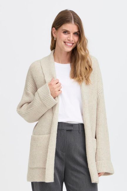 The Beverly is a great throw on cardigan from Scandi brand FRANSA. An edge to edge knit in a fisherman style knit with a roll collar and front pockets. Generous in fit.