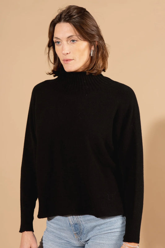 This high neck jumper is a must-have winter staple, crafted in a soft and breathable viscose mix for all-day comfort. The clean silhouette and flattering fit make it an easy addition to any cold-weather collection. Available in different colours, it’s ideal for layering or wearing as a statement piece.
