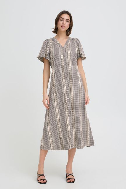 A classic dress for Spring from FRANSA in a monochrome print. A midi length dress with a V neck with a button front. The sleeves are short and cover the top of the arm. The ruching at the back allows a beautiful fit. The fit is true to size.