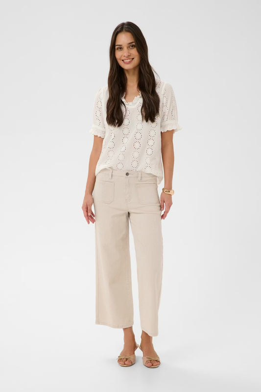 Cropped wide leg jeans from KAFFE feature a flattering high-rise waist, front patch pockets, and subtle A-line silhouette. Belt loops and button fly enhance the structured look. Fit is true to size.