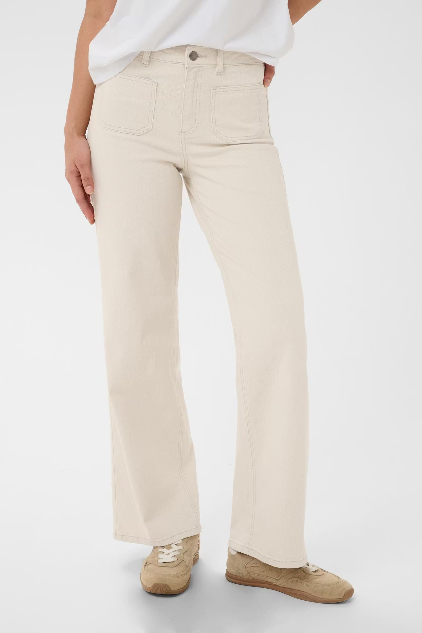Straight leg jeans from KAFFE stand out with a structured silhouette, feature front patch pockets, belt loops, and a classic zip fly. Effortlessly clean style defined by its visible details and minimalist finish. The fit is true to size.