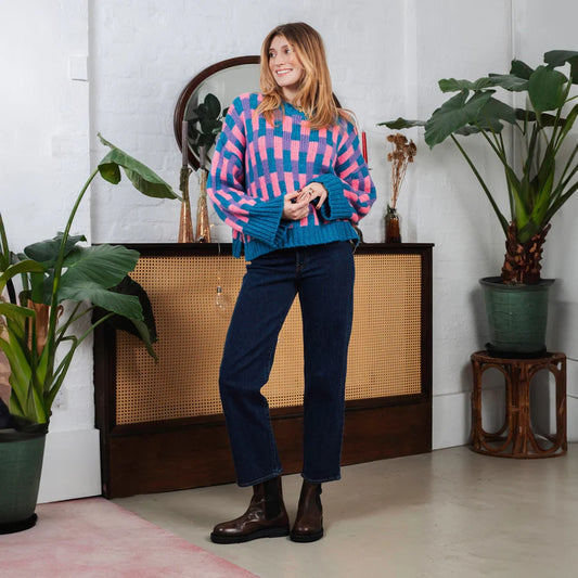 Colour lovers, this one’s for you. Charlotte from CARA AND THE SKY is a striped knit that brings bold energy and joyful style to your cold-weather wardrobe. Designed in a boxy, oversized fit, with wide sleeves and side split for a flattering fit, she’s made to move with you and lift your mood.