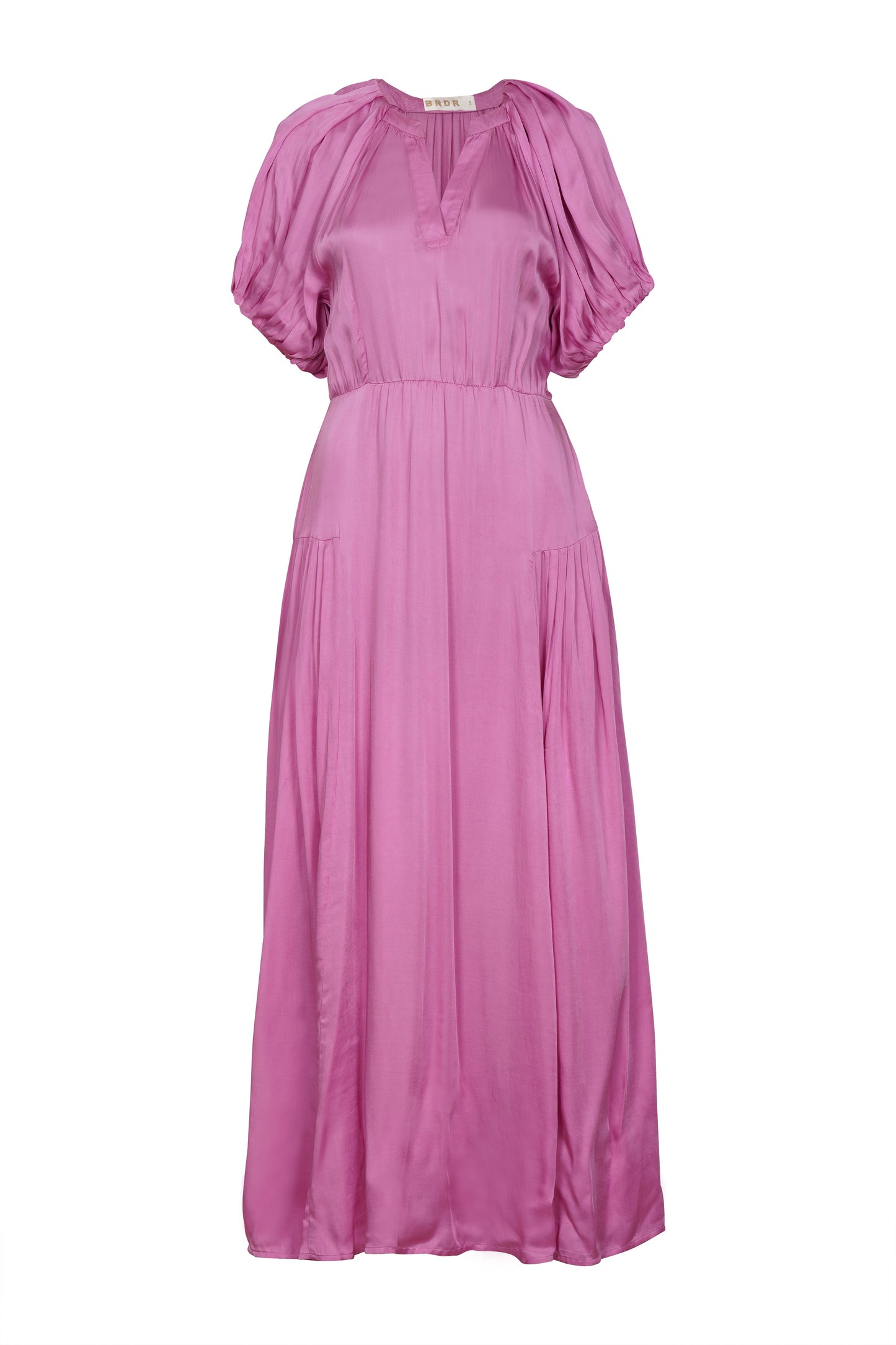 A stunning piece from BRDR which is perfect for any occasion. In a silky feel fabric and a vibrant lilac this piece will take you anywhere. A maxi length Summer dress with gently puffed sleeves and a flattering notch neck with gentle gathering around the neck. The skirt has pleating either side to add fullness. There are also pockets in the side seems and a self coloured belt. Fully lined with a cotton lining.
