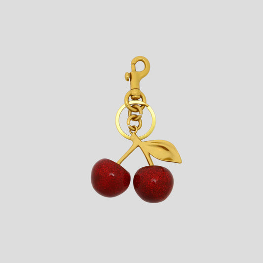 Say hello to the charm that everyone wants — the STICKYBESTIE Cherry Bag Charm. Crafted from high-quality metal with a glossy enamel finish, this playful piece brings instant pop and personality to any bag, phone sling, or keychain.