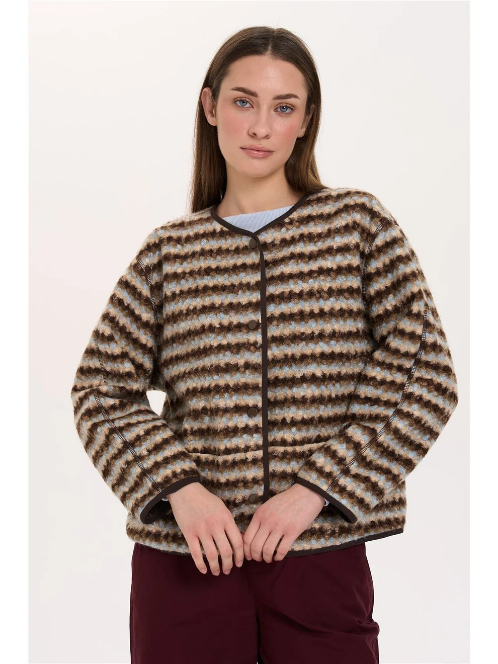 A short, relaxed-fit jacket with a round neckline and press-stud fastening. The striped bouclé fabric and contrasting trims add distinctive details.
