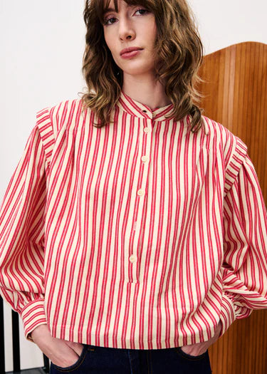 A striking stripe blouse from Parisian brand FRNCH in one of their exclusive fabrics. Long stylish balloon sleeves with a cuff with two buttons to fasten. It has a mandarin collar and a button front to a half placket and has dramatic shoulder detail.