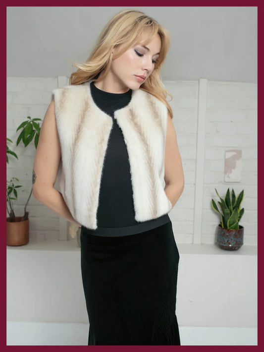 Add the Edelweiss Faux Fur Gilet to your wardrobe and enjoy the perfect blend of comfort and high-fashion glamour from NOOKI.
