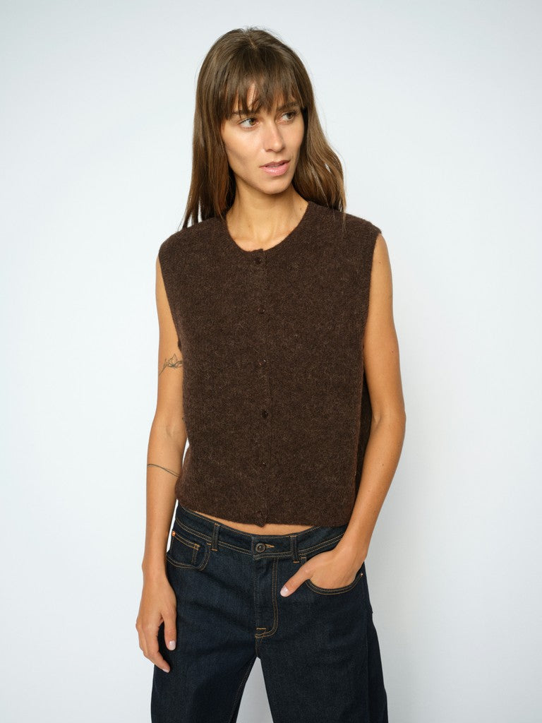 Soft knit vest from MOS MOSH crafted from a blend of warm wool and alpaca. It's designed in a regular fit with a beautiful button closure. Wear over a shirt, a dress or with tailored pants for a casual work look.