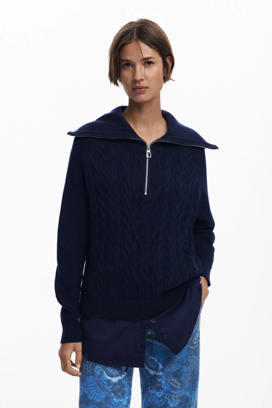 Combined round neck and long sleeve sweater from Spanish brand DESIGUAL. Knitted collar with zipper, cable texture, and shirt hem applique giving a two-piece effect. Fits true to size.
