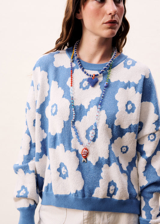 A relaxed, contemporary silhouette with an expressive edge from Parisian brand FRNCH. Crafted from soft knit fabric and featuring bold floral print. This striking blue and white combination is super fresh. The round neck and dropped shoulders are designed to flatter