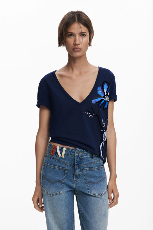 Navy blue short-sleeved T-shirt from Spanish brand DESIGUAL with V-neck and vase with flower print.