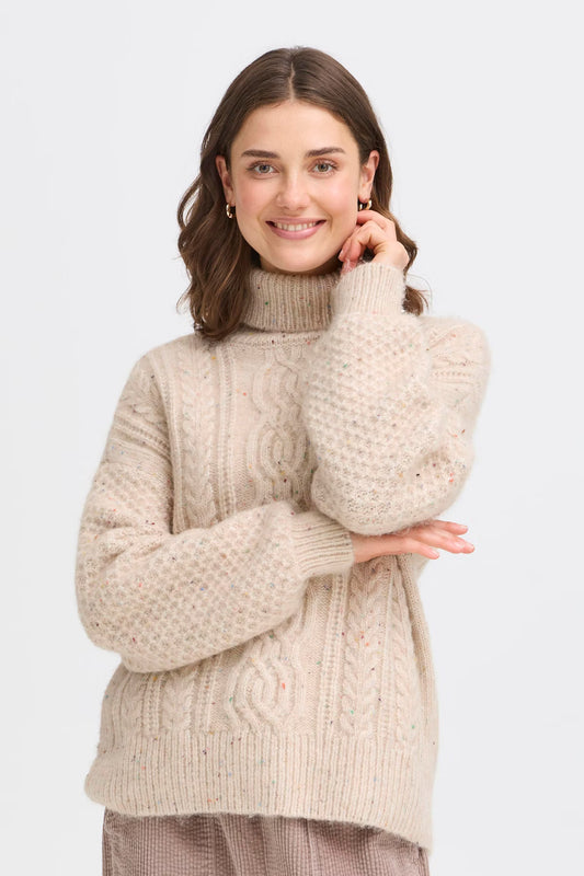 Discover this women's turtleneck sweater from FRANSA featuring a relaxed fit and intricate cable knit design. This long-sleeve knitwear provides comfort and warmth, making it ideal for daily wear during cooler seasons. Fits true to size.