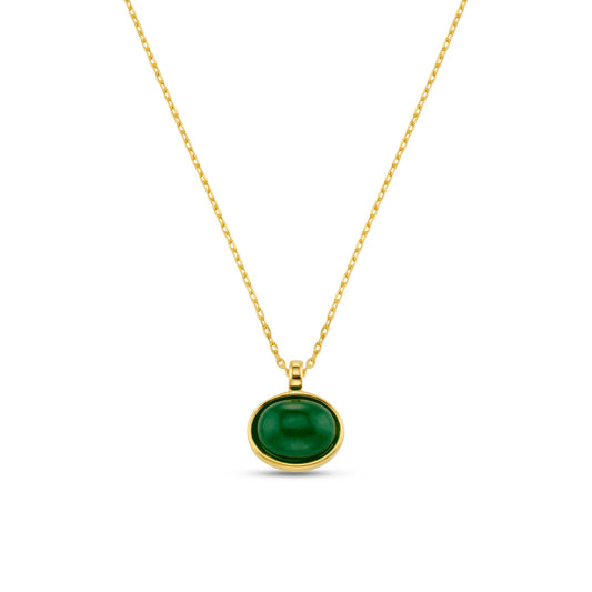 The Semi-Precious Green Pendant Necklace, featuring a beautifully cut green Jade semi-precious stone set in a gold-tone frame, this pendant captures light and attention with its rich, earthy hue and subtle veining.
