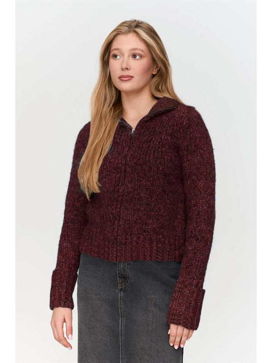 The Emma knit from German brand 24 COLOURS is a fabulous funnel neck cardigan. It is a zip front chunky piece with rolled back ribbed cuffs. The fit is true to size.