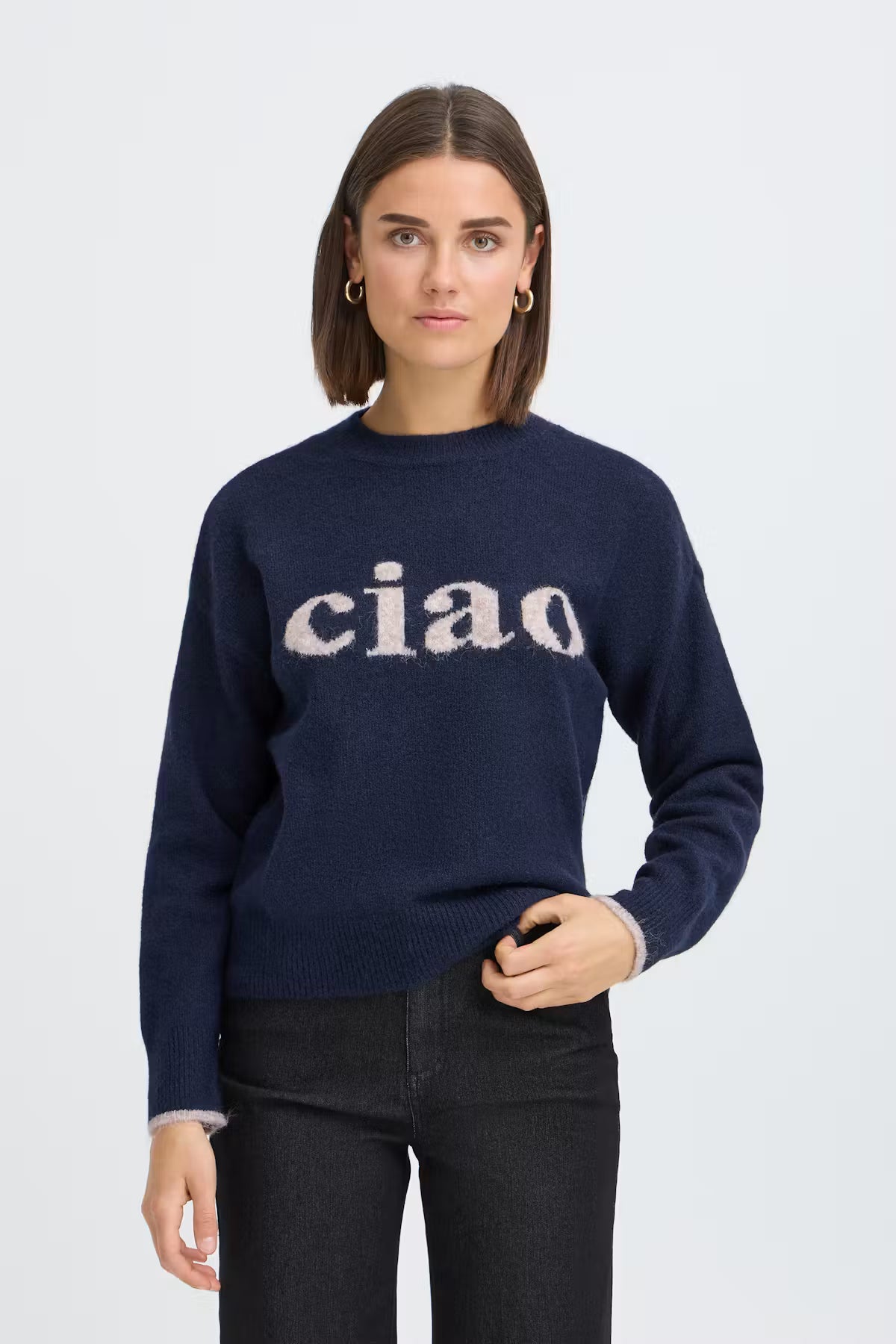 This sweater f from FRANSA features a straight fit and soft, fuzzy texture, with a classic crew neckline and long sleeves. Ribbed hems add subtle definition to the relaxed silhouette. With the word "Ciao" on the front it makes it super quirky.