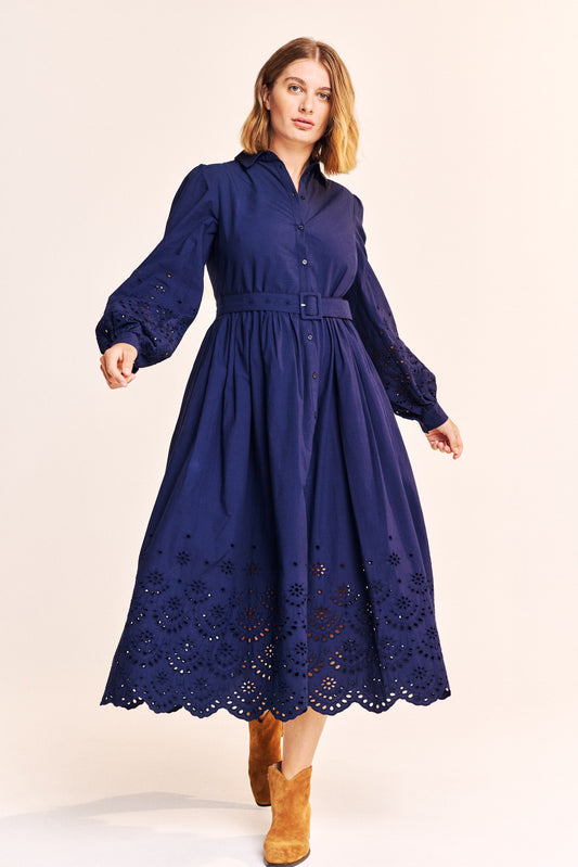 Another gorgeous piece from ONE COLLECTIVE in a beautiful cotton poplin. Long sleeved shirt dress . Half lined on the full skirt with a broderie anglais hem and sleeves. There are side pockets and a belt.