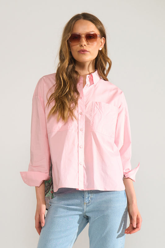 A timeless shirt with a beautifully feminine twist, the NUFOREST Shirt by Numph combines classic tailoring with delicate floral detailing. From the front, it features a smart, structured silhouette with a traditional collar, button-through fastening, and two breast pockets for an effortlessly polished look.