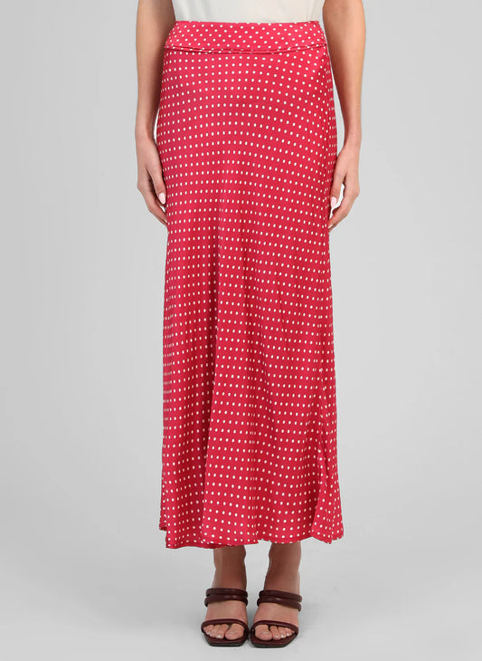 Chic, feminine and effortlessly flattering, the Galice Slip Skirt from An'ge is a timeless wardrobe staple with a playful twist. Featuring a classic polka dot print on a rich raspberry base, this beautiful skirt brings a pop of colour and elegance to any outfit.