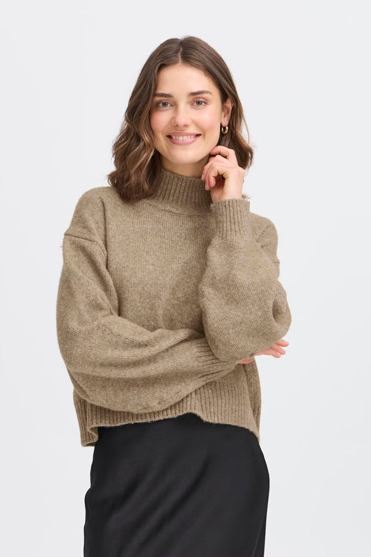 This women's turtleneck sweater from FRANSA offers a relaxed fit and modern silhouette. Features ribbed neckline, cuffs, and hem for added comfort and style. An ideal knit for layering in any casual or transitional wardrobe.