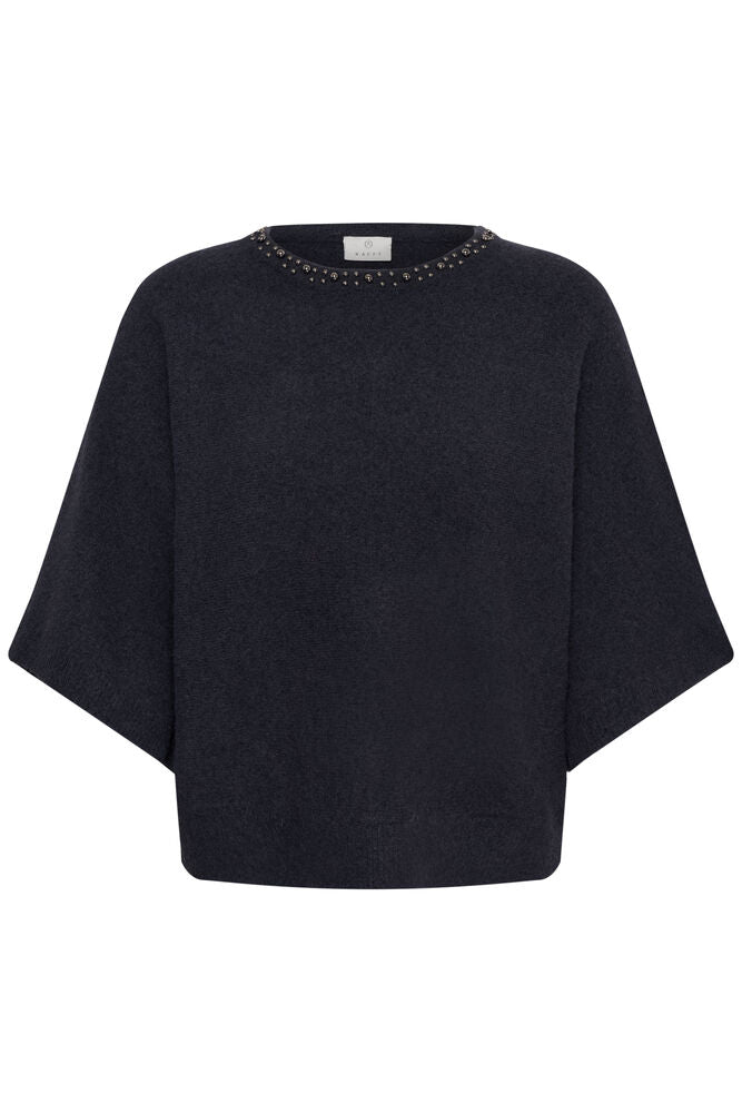 A beautiful Knit from Scandi brand KAFFE in a stunning graphite colour. The round neck piece has elbow length wing shaped sleeves. There is beading around the neck at the front . This piece can be worn for an occasion and would look great with a slip skirt or dressed down with denim.