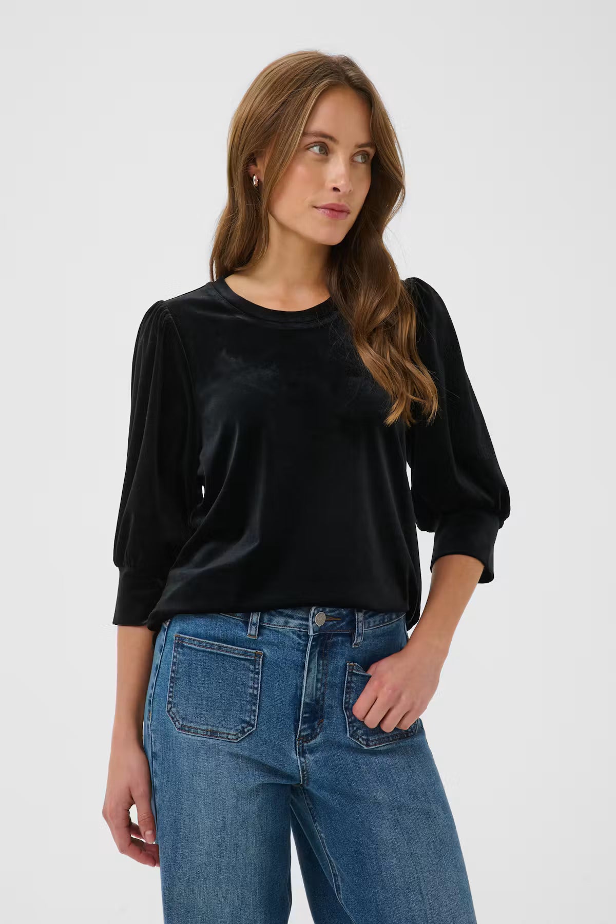 This top from KAFFE features a regular silhouette with a round neckline and three-quarter length puff sleeves finished with wide cuffs. Its smooth-looking surface and subtle gathering at the shoulder seams give the piece added dimension without compromising its clean lines.