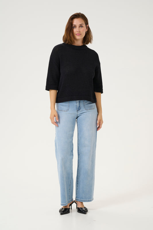 A great summer knit from Scadi brand KAFFE at a fabulous price point. Boxy with an elbow length sleeve and a slightly higher round neck this is a great piece for the better weather or for layering now. The fit is true to size.