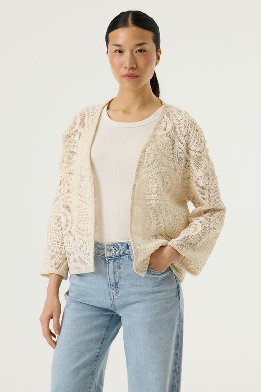 A beautiful lace style jacket/cardigan from GARCIA. The perfect piece to wear for a occasion or simply with jeans. It is V necked and edge to edge with a three quarter sleeve. The fit is true to size.