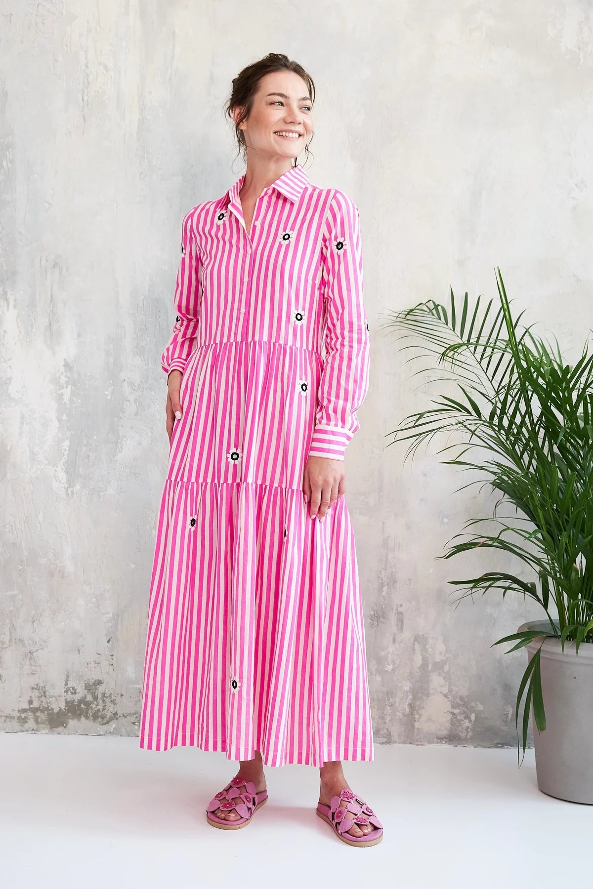 Another stunning piece from French brand CHICO SOLEIL. This long maxi length dress is in a shirt style with delicate embroidery and tiny mirrors on the front. Perfect for a fresh and stylish look with its long sleeves and tiered skirt. It buttons from the collar to the waist and has side pockets. The fit is true to size.