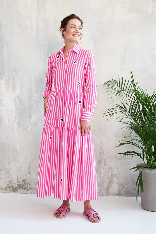 Another stunning piece from French brand CHICO SOLEIL. This long maxi length dress is in a shirt style with delicate embroidery and tiny mirrors on the front. Perfect for a fresh and stylish look with its long sleeves and tiered skirt. It buttons from the collar to the waist and has side pockets. The fit is true to size.
