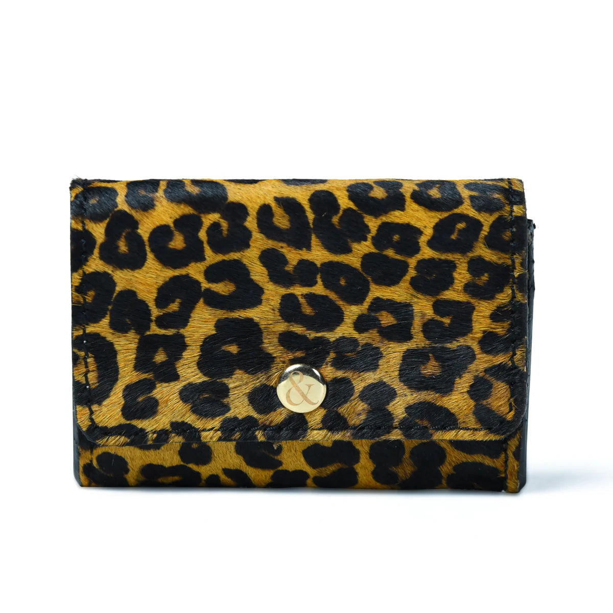 With more space for your cards and notes, and an added zip section for your coins, our new Amelie purse will keep your money and cards in place.

Hand made in our leopard print 'pony' leather with our personalised ampersand popper stud closure.