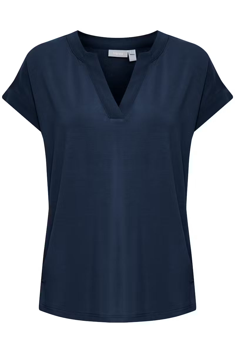 V-neck top from FRANSA with a straight fit and soft finish. Features short rolled sleeves, subtle side slits, and a curved hem for effortless style and versatility. The fit is true to size.